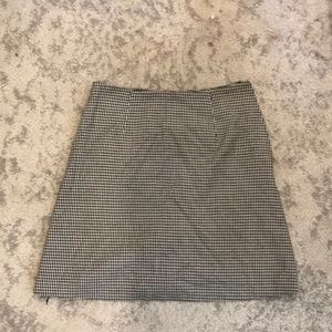 A line mini skirt in black & white check pattern